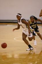 The Georgia Tech women's basketball team played Wake Forest.

Filename: IMG_1141.jpg
Aperture: f/2.8
Shutter Speed: 1/320
Body: Canon EOS DIGITAL REBEL
Lens: Canon EF 80-200mm f/2.8 L