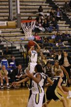 The Georgia Tech women's basketball team played Wake Forest.

Filename: IMG_1126.jpg
Aperture: f/2.8
Shutter Speed: 1/320
Body: Canon EOS DIGITAL REBEL
Lens: Canon EF 80-200mm f/2.8 L