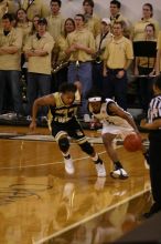 The Georgia Tech women's basketball team played Wake Forest.

Filename: IMG_1149.jpg
Aperture: f/2.8
Shutter Speed: 1/320
Body: Canon EOS DIGITAL REBEL
Lens: Canon EF 80-200mm f/2.8 L