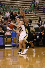 The Georgia Tech women's basketball team played Wake Forest.

Filename: IMG_1015.jpg
Aperture: f/2.8
Shutter Speed: 1/320
Body: Canon EOS DIGITAL REBEL
Lens: Canon EF 80-200mm f/2.8 L