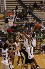 The Georgia Tech women's basketball team played Wake Forest.

Filename: IMG_1165.jpg
Aperture: f/2.8
Shutter Speed: 1/320
Body: Canon EOS DIGITAL REBEL
Lens: Canon EF 80-200mm f/2.8 L