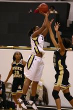 The Georgia Tech women's basketball team played Wake Forest.

Filename: IMG_1032.jpg
Aperture: f/2.8
Shutter Speed: 1/320
Body: Canon EOS DIGITAL REBEL
Lens: Canon EF 80-200mm f/2.8 L