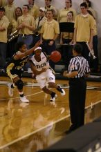 The Georgia Tech women's basketball team played Wake Forest.

Filename: IMG_1148.jpg
Aperture: f/2.8
Shutter Speed: 1/320
Body: Canon EOS DIGITAL REBEL
Lens: Canon EF 80-200mm f/2.8 L