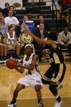 The Georgia Tech women's basketball team played Wake Forest.

Filename: IMG_1157.jpg
Aperture: f/2.8
Shutter Speed: 1/320
Body: Canon EOS DIGITAL REBEL
Lens: Canon EF 80-200mm f/2.8 L