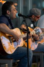 The Gene Pool, performing at the Austin airport.  Geno Stroia II on vocals/guitar, Jorge Castillo on vocals/guitar, Travis Woodard on drums and Steven Ray Will on vocals/bass guitar.

Filename: SRM_20060518_155728_6.jpg
Aperture: f/2.8
Shutter Speed: 1/250
Body: Canon EOS 20D
Lens: Canon EF 80-200mm f/2.8 L