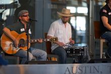 The Gene Pool, performing at the Austin airport.  Geno Stroia II on vocals/guitar, Jorge Castillo on vocals/guitar, Travis Woodard on drums and Steven Ray Will on vocals/bass guitar.

Filename: SRM_20060518_160134_3.jpg
Aperture: f/2.8
Shutter Speed: 1/250
Body: Canon EOS 20D
Lens: Canon EF 80-200mm f/2.8 L