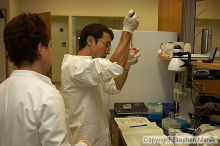 Lilya Matyunina trains new graduate student Masahin Kajita in the Ovarian Cancer Institute lab located in IBB.

Filename: crw_0792_std.jpg
Aperture: f/5.6
Shutter Speed: 1/60
Body: Canon EOS DIGITAL REBEL
Lens: Canon EF-S 18-55mm f/3.5-5.6