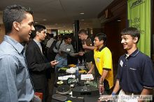 Sajit Jumani and Christopher Zhang talk to Bose representatives.

Filename: crw_0783_std.jpg
Aperture: f/5.0
Shutter Speed: 1/60
Body: Canon EOS DIGITAL REBEL
Lens: Canon EF-S 18-55mm f/3.5-5.6