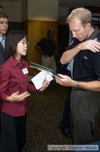 Fong Ting speaks with a recruiter at the career fair.
Filename: crw_0765_std.jpg
Aperture: f/5.0
Shutter Speed: 1/60
Body: Canon EOS DIGITAL REBEL
Lens: Canon EF-S 18-55mm f/3.5-5.6