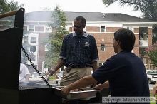 Coach Paul Hewitt and Jimmy Mitchell grill hamburgers at AXO Thursday night.  AXO was the winning sorority for the basketball attendance competition.

Filename: crw_0039_std.jpg
Aperture: f/9.0
Shutter Speed: 1/125
Body: Canon EOS DIGITAL REBEL
Lens: Sigma 15-30mm f/3.5-4.5 EX Aspherical DG DF