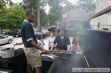 Coach Paul Hewitt and Jimmy Mitchell grill hamburgers at AXO Thursday night.  AXO was the winning sorority for the basketball attendance competition.

Filename: crw_0053_std.jpg
Aperture: f/6.3
Shutter Speed: 1/80
Body: Canon EOS DIGITAL REBEL
Lens: Sigma 15-30mm f/3.5-4.5 EX Aspherical DG DF