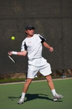 Rook Schellenberg (UT) defeated George Gvelesiani (GT) 6-3, 7-6.  The University of Texas (UT) men's tennis team defeated Georgia Tech (GT) Saturday, February 24, 2007..

Filename: SRM_20070224_1512025.jpg
Aperture: f/4.0
Shutter Speed: 1/4000
Body: Canon EOS-1D Mark II
Lens: Canon EF 80-200mm f/2.8 L