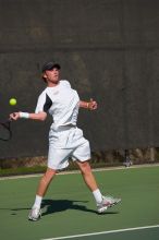 Rook Schellenberg (UT) defeated George Gvelesiani (GT) 6-3, 7-6.  The University of Texas (UT) men's tennis team defeated Georgia Tech (GT) Saturday, February 24, 2007..

Filename: SRM_20070224_1512107.jpg
Aperture: f/4.0
Shutter Speed: 1/4000
Body: Canon EOS-1D Mark II
Lens: Canon EF 80-200mm f/2.8 L