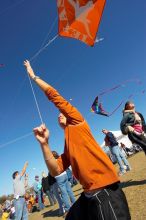 Chris Lam attempts to fly his UT kite at the 79th annual Zilker Park Kite Festival, Sunday, March 4, 2007.
Filename: SRM_20070304_1532146.jpg
Aperture: f/11.0
Shutter Speed: 1/250
Body: Canon EOS-1D Mark II
Lens: Sigma 15-30mm f/3.5-4.5 EX Aspherical DG DF