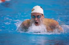 Georgia's Hunter Lainhart competed in the 400 yard IM with a time of 4:11.04. The University of Texas Longhorns defeated The University of Georgia Bulldogs 157-135 on Saturday, January 12, 2008.
Filename: SRM_20080112_1239422.jpg
Aperture: f/2.8
Shutter Speed: 1/400
Body: Canon EOS-1D Mark II
Lens: Canon EF 300mm f/2.8 L IS