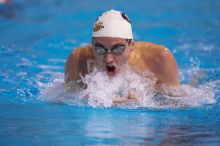 Georgia's Hunter Lainhart competed in the 400 yard IM with a time of 4:11.04. The University of Texas Longhorns defeated The University of Georgia Bulldogs 157-135 on Saturday, January 12, 2008.
Filename: SRM_20080112_1239443.jpg
Aperture: f/2.8
Shutter Speed: 1/400
Body: Canon EOS-1D Mark II
Lens: Canon EF 300mm f/2.8 L IS