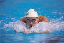 Georgia's Hunter Lainhart competed in the 400 yard IM with a time of 4:11.04. The University of Texas Longhorns defeated The University of Georgia Bulldogs 157-135 on Saturday, January 12, 2008.
Filename: SRM_20080112_1239464.jpg
Aperture: f/2.8
Shutter Speed: 1/400
Body: Canon EOS-1D Mark II
Lens: Canon EF 300mm f/2.8 L IS