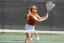 First doubles UT sophomore Vanja Corovic and UT junior Marija Milic defeated CSUS sophomore Aileen Tsan and CSUS junior Anastassia Lyssenko 8-3.  The University of Texas defeated Sacramento State on Saturday, March 22, 2008.

Filename: SRM_20080322_1155225.jpg
Aperture: f/4.0
Shutter Speed: 1/3200
Body: Canon EOS-1D Mark II
Lens: Canon EF 300mm f/2.8 L IS