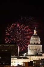 Austin Independence Day fireworks with the Capitol building, as viewed from atop the Manor Garage at The University of Texas at Austin.  The fireworks were launched from Auditorium Shores, downtown Austin, Friday, July 4, 2008.

Filename: SRM_20080704_2146242.jpg
Aperture: f/11.0
Shutter Speed: 5/1
Body: Canon EOS 20D
Lens: Canon EF 80-200mm f/2.8 L