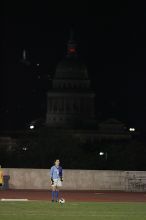 UT senior Dianna Pfenninger (#8, Goalkeeper) takes a goal kick with the capitol in the background.  The University of Texas women's soccer team tied 0-0 against the Texas A&M Aggies Friday night, September 27, 2008.

Filename: SRM_20080926_2050145.jpg
Aperture: f/2.8
Shutter Speed: 1/500
Body: Canon EOS-1D Mark II
Lens: Canon EF 300mm f/2.8 L IS
