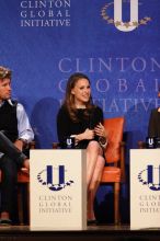 Blake Mycoskie (L), founder of TOMS shoes, and Natalie Portman (R) at the first plenary session of the CGIU meeting.  Day one of the 2nd Annual Clinton Global Initiative University (CGIU) meeting was held at The University of Texas at Austin, Friday, February 13, 2009.

Filename: SRM_20090213_17060440.jpg
Aperture: f/4.0
Shutter Speed: 1/250
Body: Canon EOS 20D
Lens: Canon EF 300mm f/2.8 L IS