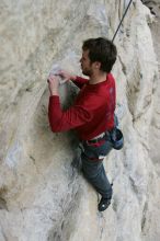 Me top rope climbing Diving for Rocks (5.10d), photographed from  the third bolt of Magster (5.10a) by Andrew Dreher.  It was another long day of rock climbing at Seismic Wall on Austin's Barton Creek Greenbelt, Saturday, April 11, 2009.

Filename: SRM_20090411_17163030.JPG
Aperture: f/5.6
Shutter Speed: 1/320
Body: Canon EOS-1D Mark II
Lens: Canon EF 16-35mm f/2.8 L