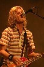 Puddle of Mudd performs on the first day of Music Midtown, 2004.
Filename: IMG_6048.jpg
Aperture: f/3.5
Shutter Speed: 1/160
Body: Canon EOS DIGITAL REBEL
Lens: Canon EF 80-200mm f/2.8 L