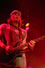 Puddle of Mudd performs on the first day of Music Midtown, 2004.
Filename: IMG_6051.jpg
Aperture: f/2.8
Shutter Speed: 1/160
Body: Canon EOS DIGITAL REBEL
Lens: Canon EF 80-200mm f/2.8 L