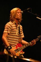 Puddle of Mudd performs on the first day of Music Midtown, 2004.
Filename: IMG_6055.jpg
Aperture: f/3.2
Shutter Speed: 1/160
Body: Canon EOS DIGITAL REBEL
Lens: Canon EF 80-200mm f/2.8 L