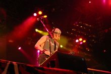 Puddle of Mudd performs on the first day of Music Midtown, 2004.
Filename: IMG_6046.jpg
Aperture: f/4.0
Shutter Speed: 1/50
Body: Canon EOS DIGITAL REBEL
Lens: Canon EF 50mm f/1.8 II