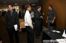 A line waits to talk to Qualcomm recruiters.

Filename: crw_0779_std.jpg
Aperture: f/5.0
Shutter Speed: 1/60
Body: Canon EOS DIGITAL REBEL
Lens: Canon EF-S 18-55mm f/3.5-5.6