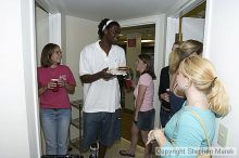 Clarence Moore talks to Kamber Christensen and Teresa Drew at AXO Thursday night.  AXO was the winning sorority for the basketball attendance competition.

Filename: crw_0070_std.jpg
Aperture: f/4.5
Shutter Speed: 1/60
Body: Canon EOS DIGITAL REBEL
Lens: Sigma 15-30mm f/3.5-4.5 EX Aspherical DG DF
