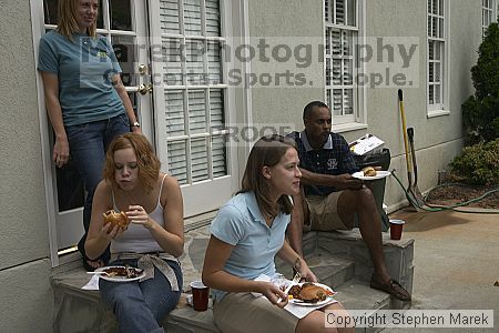 Coach Paul Hewitt grilled hamburgers at AXO Thursday night.  AXO was the winning sorority for the basketball attendance competition.

Filename: crw_0061_std.jpg
Aperture: f/8.0
Shutter Speed: 1/100
Body: Canon EOS DIGITAL REBEL
Lens: Sigma 15-30mm f/3.5-4.5 EX Aspherical DG DF