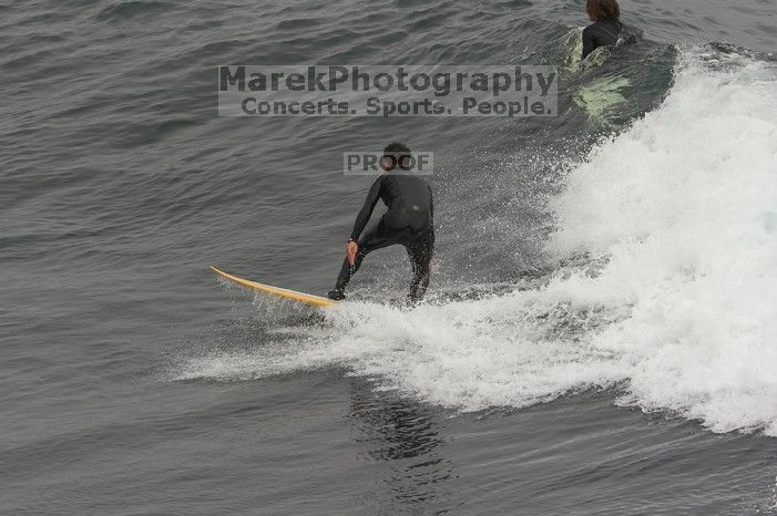 Surfers at Santa Cruz, California.

Filename: SRM_20060429_170936_2.jpg
Aperture: f/6.3
Shutter Speed: 1/800
Body: Canon EOS 20D
Lens: Canon EF 80-200mm f/2.8 L