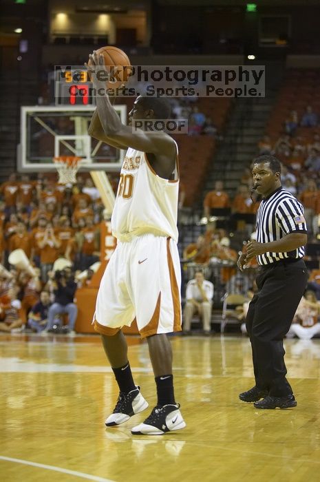 The longhorns defeated the Texas Southern University (TSU) Tigers 90-50 Tuesday night.

Filename: SRM_20061128_2037163.jpg
Aperture: f/2.8
Shutter Speed: 1/640
Body: Canon EOS-1D Mark II
Lens: Canon EF 80-200mm f/2.8 L