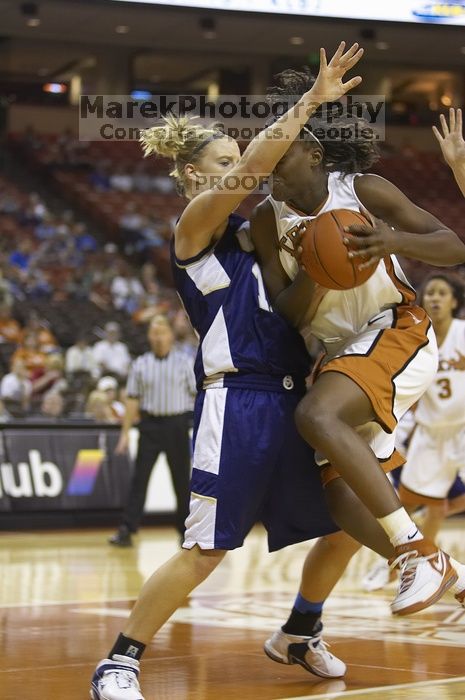 Forward Tiffany Jackson, #33.  The lady longhorns defeated the Oral Roberts University's (ORU) Golden Eagles 79-40 Saturday night.

Filename: SRM_20061125_1311200.jpg
Aperture: f/2.8
Shutter Speed: 1/400
Body: Canon EOS-1D Mark II
Lens: Canon EF 80-200mm f/2.8 L
