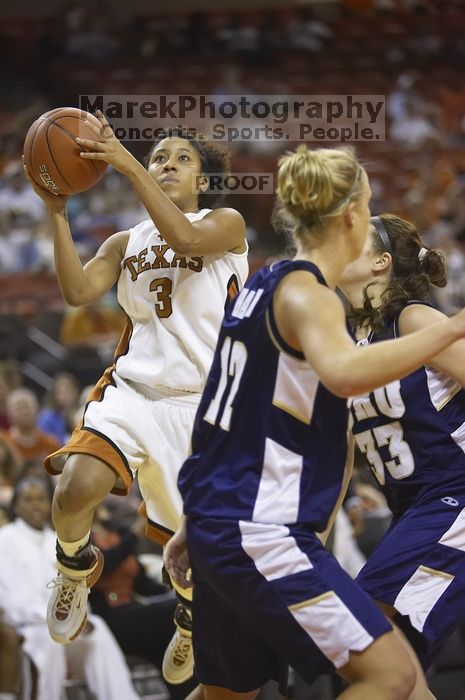 Guard Carla Cortijo, #3.  The lady longhorns defeated the Oral Roberts University's (ORU) Golden Eagles 79-40 Saturday night.

Filename: SRM_20061125_1312206.jpg
Aperture: f/2.8
Shutter Speed: 1/400
Body: Canon EOS-1D Mark II
Lens: Canon EF 80-200mm f/2.8 L