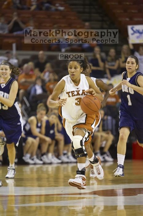 Guard Carla Cortijo, #3.  The lady longhorns defeated the Oral Roberts University's (ORU) Golden Eagles 79-40 Saturday night.

Filename: SRM_20061125_1319201.jpg
Aperture: f/2.8
Shutter Speed: 1/400
Body: Canon EOS-1D Mark II
Lens: Canon EF 80-200mm f/2.8 L