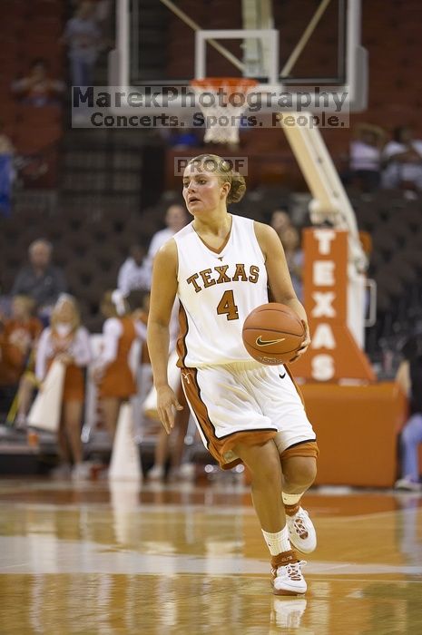 Guard Erika Arriaran, #4.  The lady longhorns defeated the Oral Roberts University's (ORU) Golden Eagles 79-40 Saturday night.

Filename: SRM_20061125_1322506.jpg
Aperture: f/2.8
Shutter Speed: 1/400
Body: Canon EOS-1D Mark II
Lens: Canon EF 80-200mm f/2.8 L