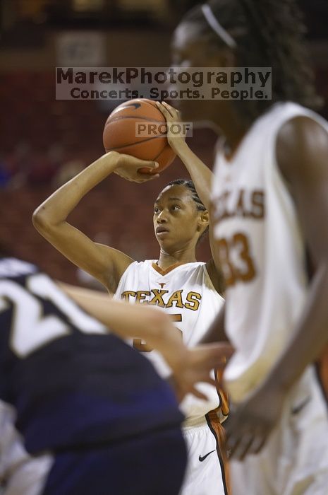 Forward Ashley Lindsey, #35.  The lady longhorns defeated the Oral Roberts University's (ORU) Golden Eagles 79-40 Saturday night.

Filename: SRM_20061125_1325383.jpg
Aperture: f/2.8
Shutter Speed: 1/400
Body: Canon EOS-1D Mark II
Lens: Canon EF 80-200mm f/2.8 L