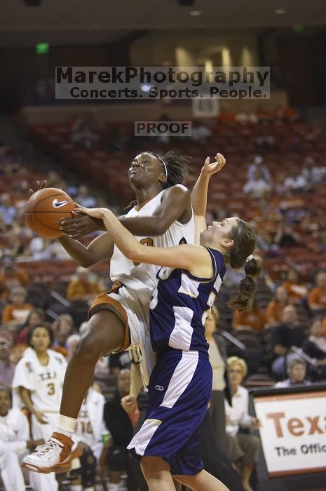 Forward Tiffany Jackson, #33.  The lady longhorns defeated the Oral Roberts University's (ORU) Golden Eagles 79-40 Saturday night.

Filename: SRM_20061125_1329109.jpg
Aperture: f/2.8
Shutter Speed: 1/400
Body: Canon EOS-1D Mark II
Lens: Canon EF 80-200mm f/2.8 L