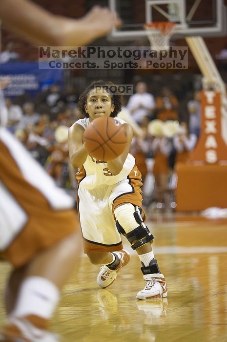 Guard Carla Cortijo, #3.  The lady longhorns defeated the Oral Roberts University's (ORU) Golden Eagles 79-40 Saturday night.

Filename: SRM_20061125_1338289.jpg
Aperture: f/2.8
Shutter Speed: 1/400
Body: Canon EOS-1D Mark II
Lens: Canon EF 80-200mm f/2.8 L