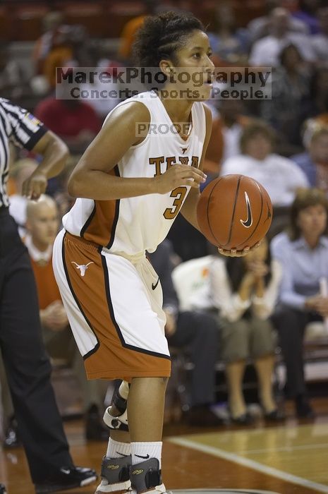 Guard Carla Cortijo, #3.  The lady longhorns defeated the Oral Roberts University's (ORU) Golden Eagles 79-40 Saturday night.

Filename: SRM_20061125_1339166.jpg
Aperture: f/2.8
Shutter Speed: 1/400
Body: Canon EOS-1D Mark II
Lens: Canon EF 80-200mm f/2.8 L