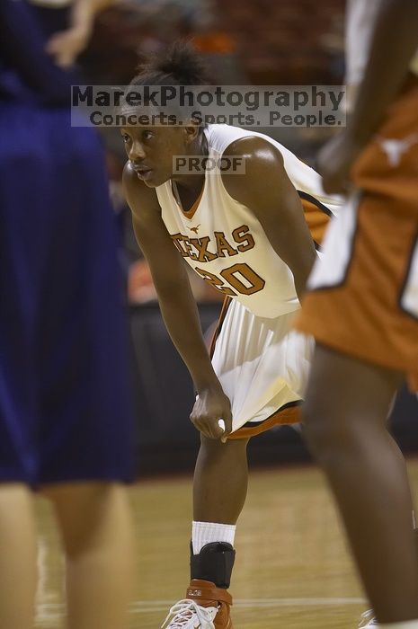 Guard Erneisha Bailey, #20. The lady longhorns defeated the Oral Roberts University's (ORU) Golden Eagles 79-40 Saturday night.
Filename: SRM_20061125_1350386.jpg
Aperture: f/2.8
Shutter Speed: 1/400
Body: Canon EOS-1D Mark II
Lens: Canon EF 80-200mm f/2.8 L