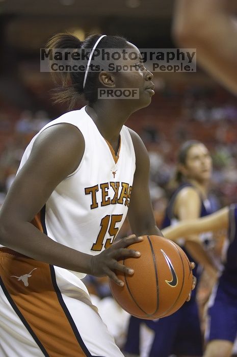 Guard and forward Gabriell Mattox, #15.  The lady longhorns defeated the Oral Roberts University's (ORU) Golden Eagles 79-40 Saturday night.

Filename: SRM_20061125_1401405.jpg
Aperture: f/2.8
Shutter Speed: 1/400
Body: Canon EOS-1D Mark II
Lens: Canon EF 80-200mm f/2.8 L