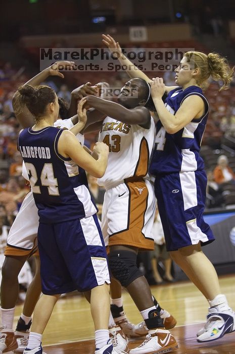 Aubry Cook, #43.  The lady longhorns defeated the Oral Roberts University's (ORU) Golden Eagles 79-40 Saturday night.

Filename: SRM_20061125_1404067.jpg
Aperture: f/2.8
Shutter Speed: 1/400
Body: Canon EOS-1D Mark II
Lens: Canon EF 80-200mm f/2.8 L