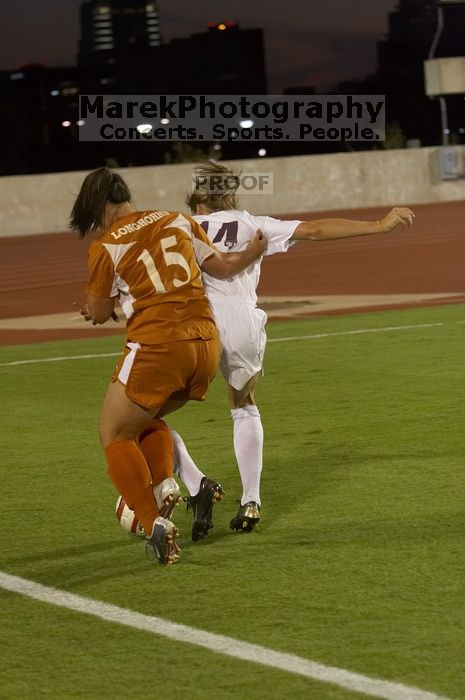 Leslie Imber, #15.  The lady longhorns beat Texas A&M 1-0 in soccer Friday night.

Filename: SRM_20061027_1913185.jpg
Aperture: f/4.0
Shutter Speed: 1/500
Body: Canon EOS 20D
Lens: Canon EF 80-200mm f/2.8 L