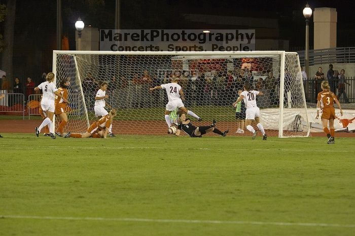 Block by Dianna Pfenninger, #10.  The lady longhorns beat Texas A&M 1-0 in soccer Friday night.

Filename: SRM_20061027_1932449.jpg
Aperture: f/4.0
Shutter Speed: 1/640
Body: Canon EOS 20D
Lens: Canon EF 80-200mm f/2.8 L