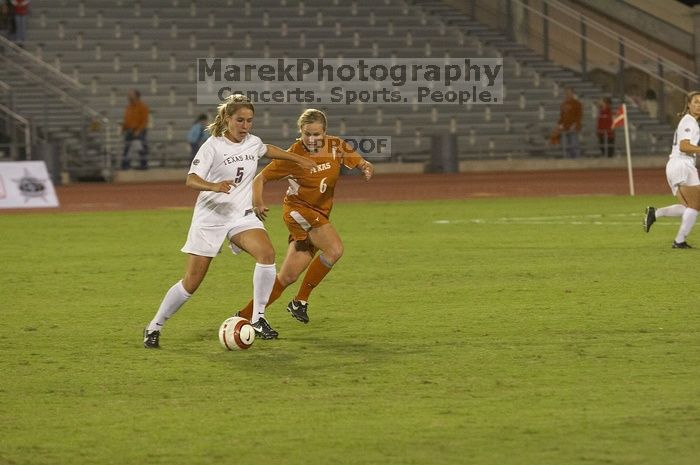 Greta Carter, #6.  The lady longhorns beat Texas A&M 1-0 in soccer Friday night.

Filename: SRM_20061027_1940406.jpg
Aperture: f/4.0
Shutter Speed: 1/640
Body: Canon EOS 20D
Lens: Canon EF 80-200mm f/2.8 L