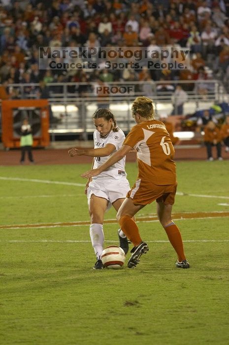 Greta Carter, #6.  The lady longhorns beat Texas A&M 1-0 in soccer Friday night.

Filename: SRM_20061027_1944242.jpg
Aperture: f/4.0
Shutter Speed: 1/640
Body: Canon EOS 20D
Lens: Canon EF 80-200mm f/2.8 L